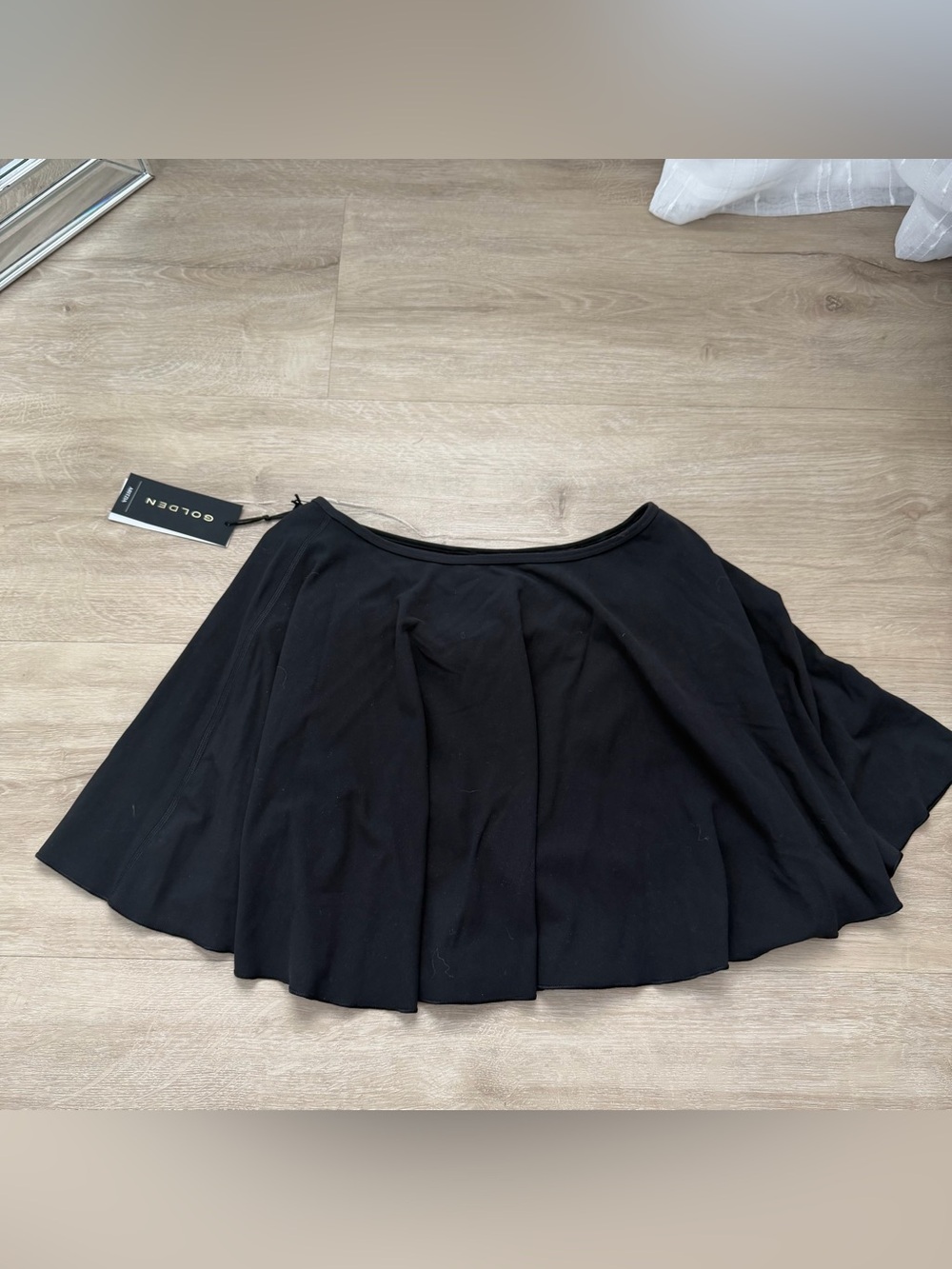 Aritzia Golden Black Butter Baseline Micro Skirt